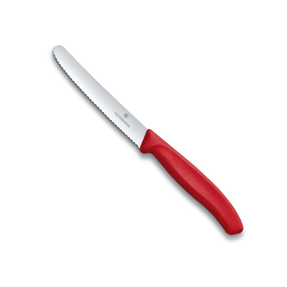 Table Knife - Victorinox - 11cm with a silver wavy-edge blade and a bright red ergonomic handle.