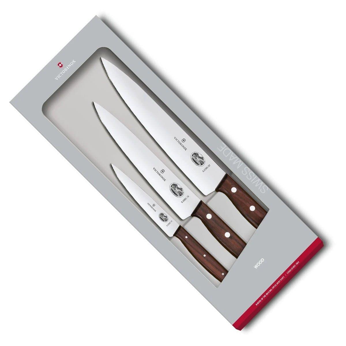 Victorinox Carving Set - 3 Piece - Rosewood with three polished steel blades and dark reddish-brown wooden handles with white rivets.