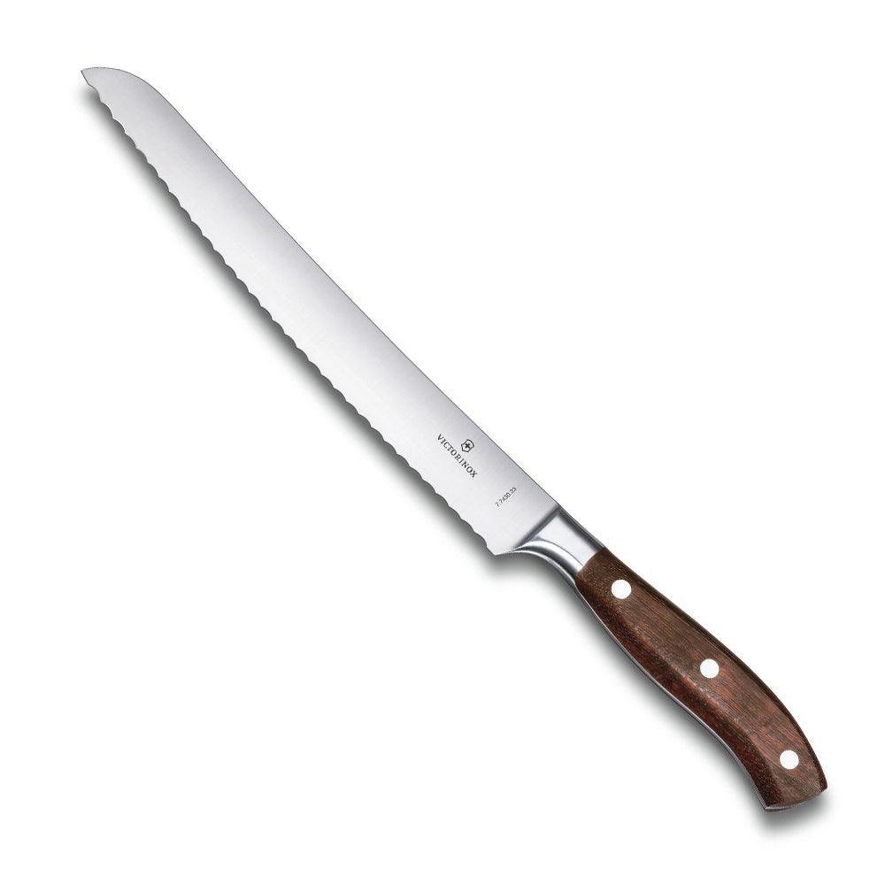 Bread knife, Victorinox Grand Maitre Bread Knife - Forged Wood Handle, with a silver serrated blade and dark brown wooden handle.