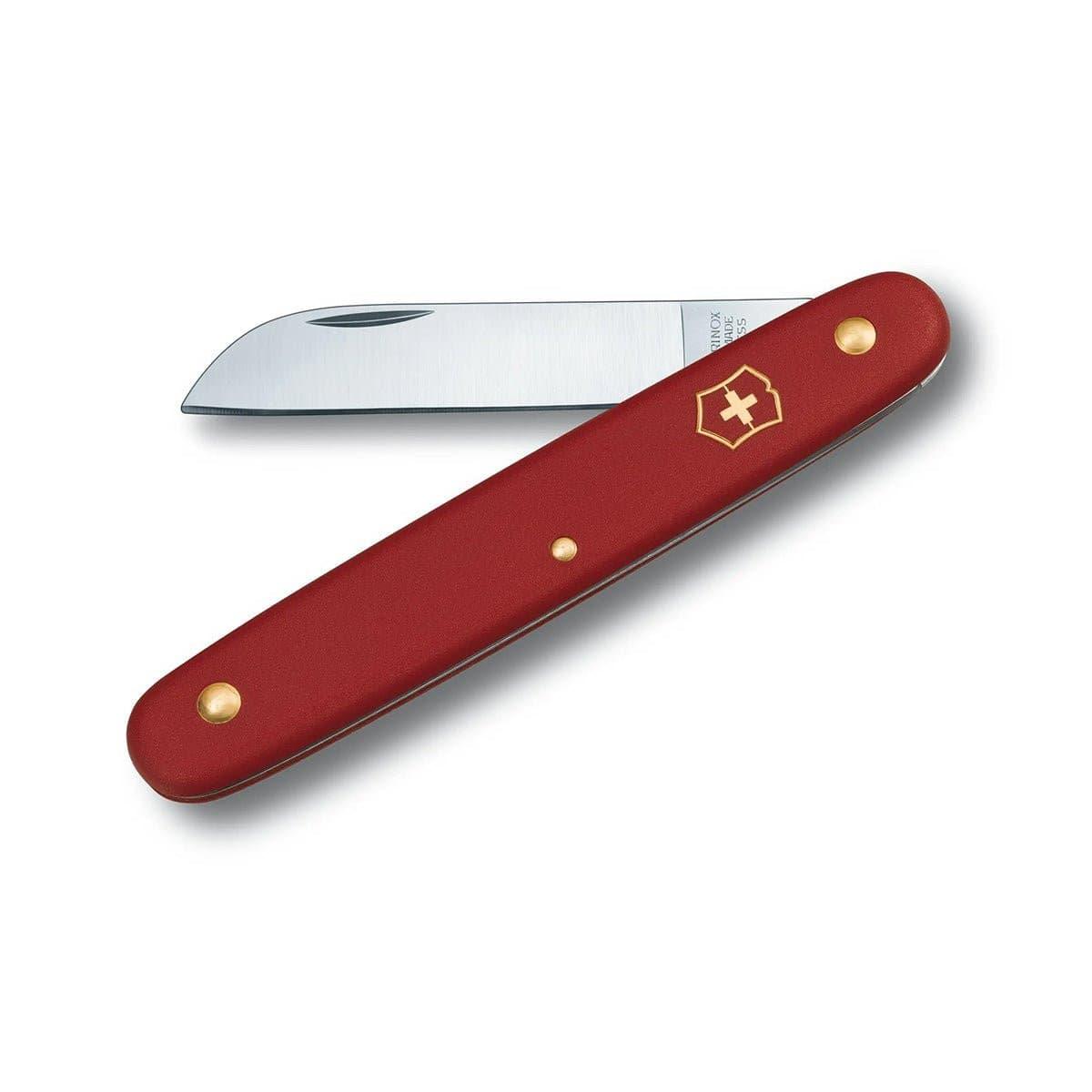 Victorinox Red Pocket Knife with a smooth red handle, gold emblem and rivets, and a straight stainless steel blade.