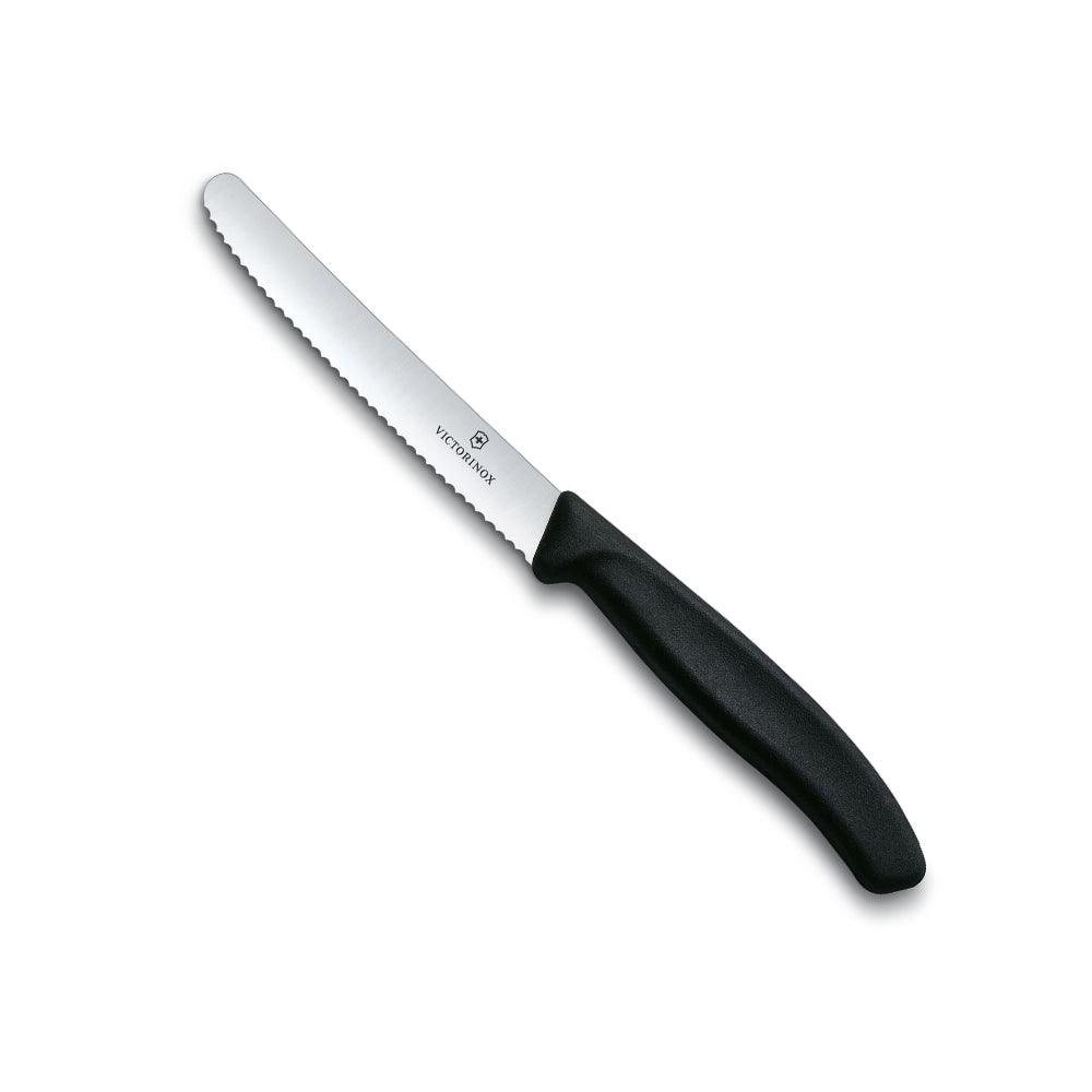Table Knife - Victorinox - 11cm with a silver wavy-edge blade and a smooth black ergonomic handle