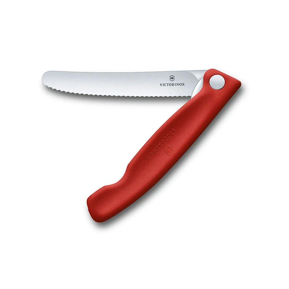 Victorinox Folding Paring Knife - Red - 11cm with a red textured handle and stainless steel wavy-edge blade.