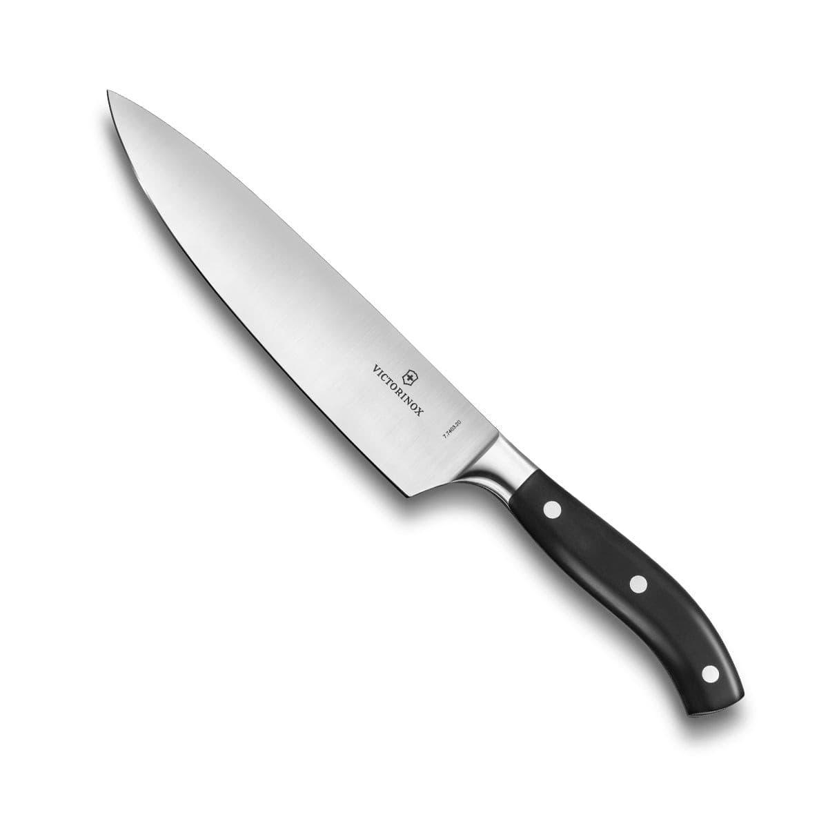 Victorinox Grand Maître Chefs Knife 20cm with a polished stainless steel blade and curved black handle with rivets.