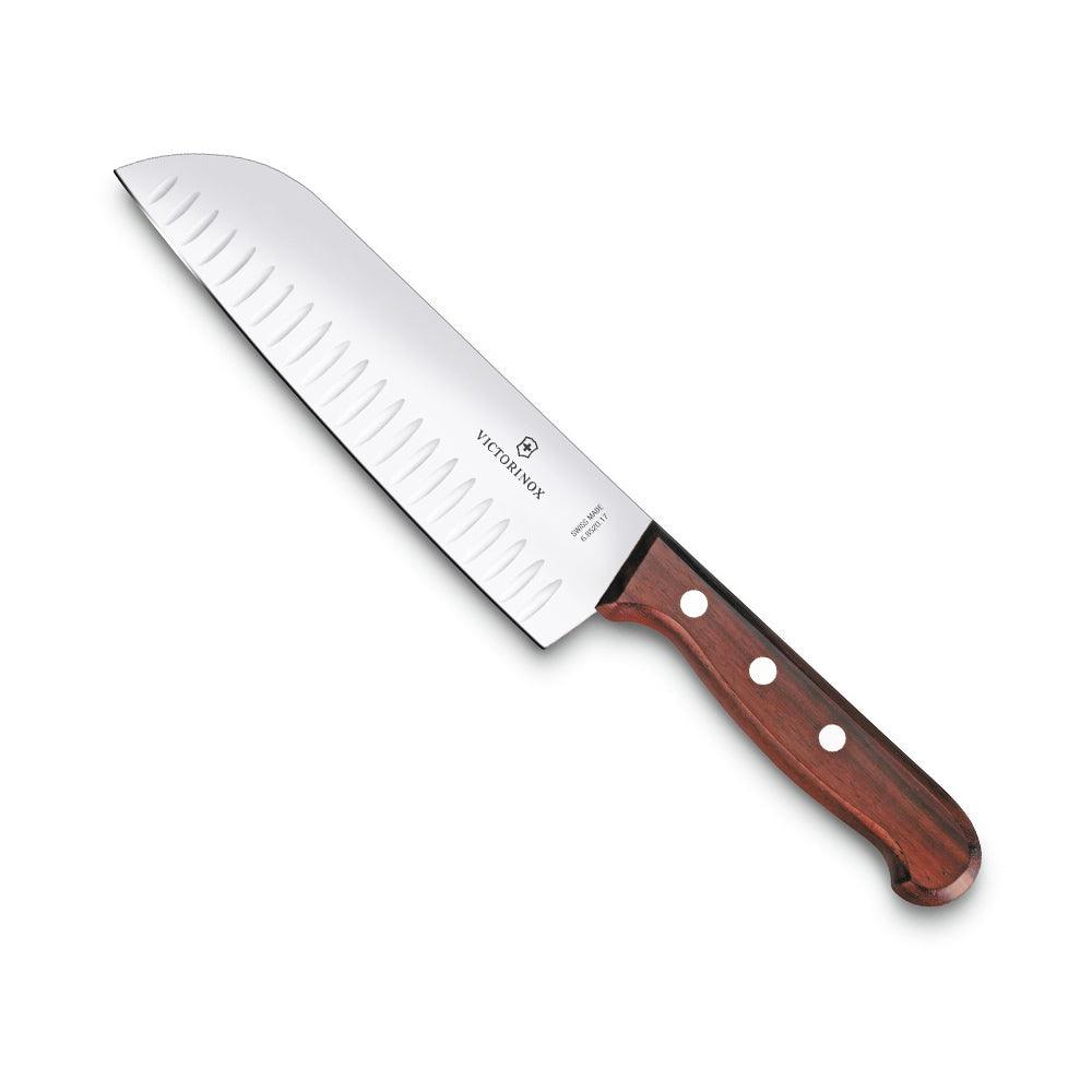 Santoku knife, Victorinox Santoku Knife Japanese, Fluted Edge - 17cm - Wooden Handle, with a silver fluted blade and reddish-brown wooden handle.